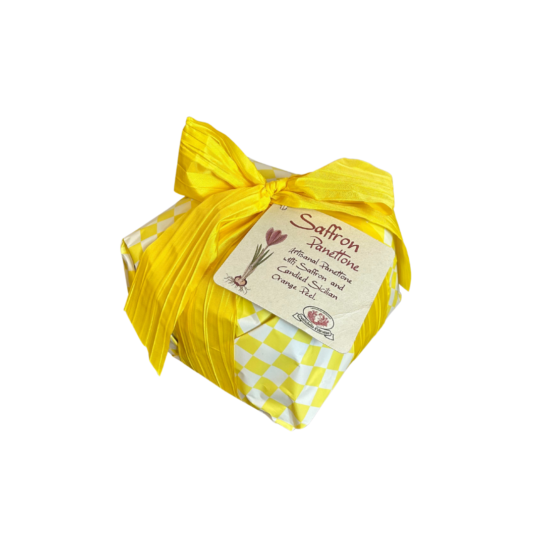 Saffron package with yellow ribbon and checkered paper on a white background