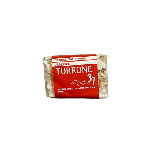 Packaged Torrone candy with red label on a white background