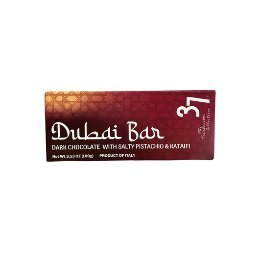 Dubai Bar chocolate packaging with red and gold design on a white background