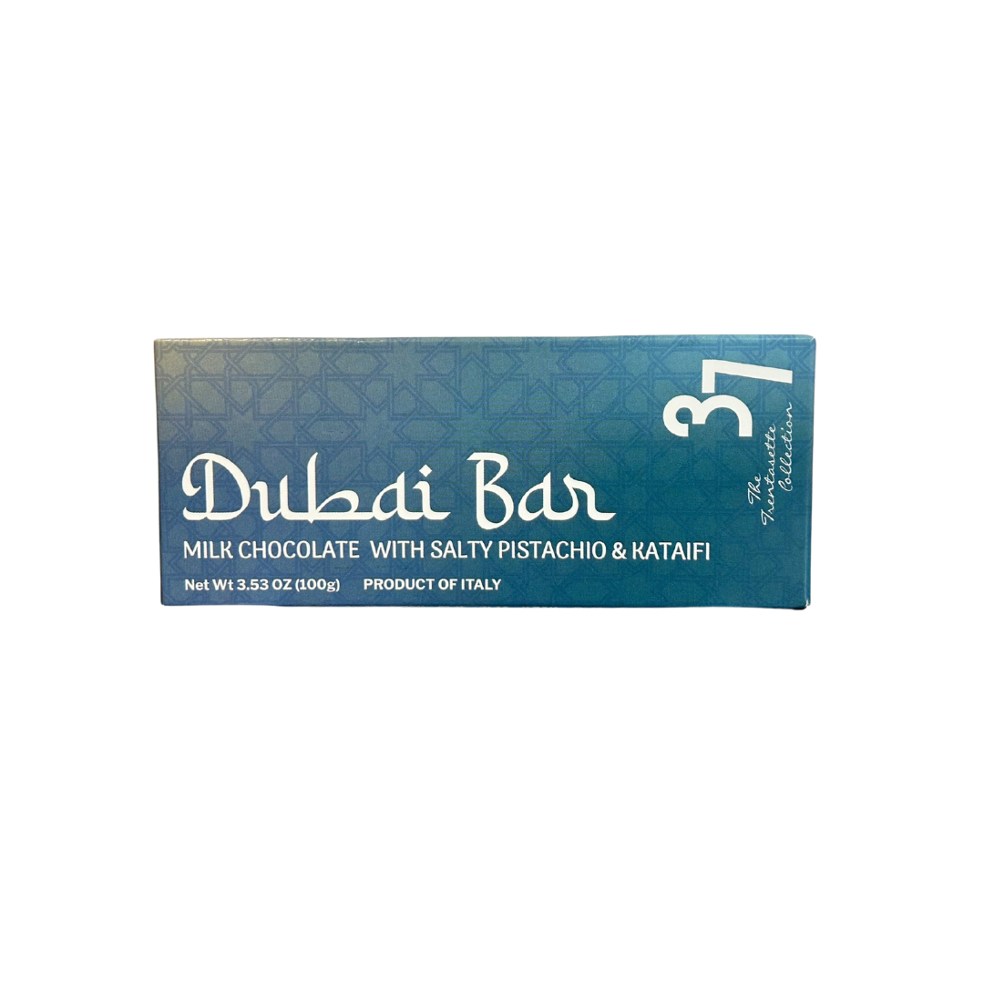 Dubai Bar chocolate packaging with blue and white design on a white background