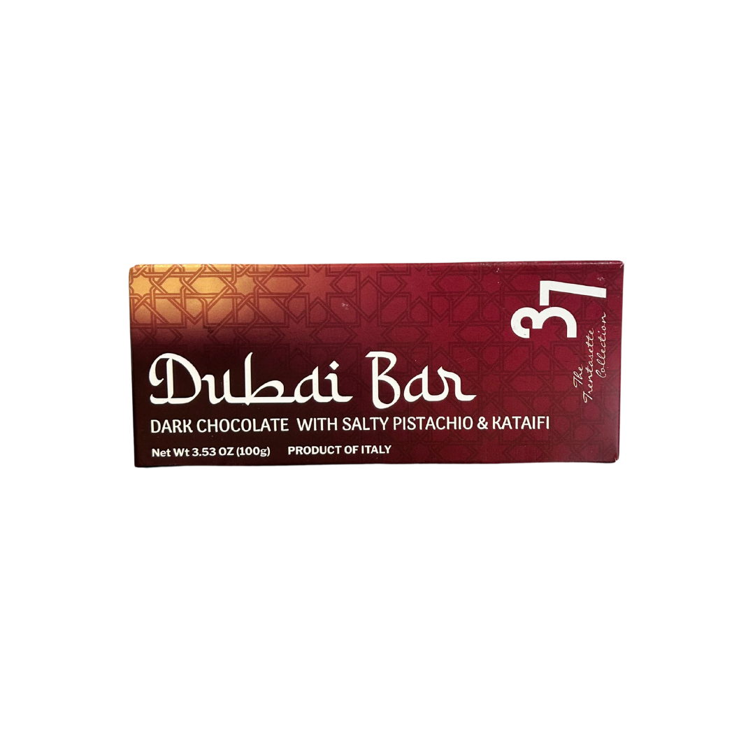 Dubai Bar chocolate packaging with red and gold design on a white background
